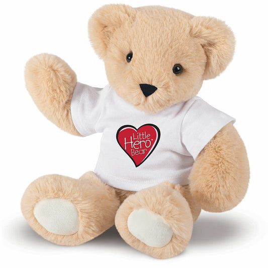 Soft tan teddy bear wearing white shirt with red heart and "Little Hero" text.