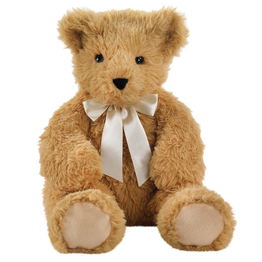 Plush light brown teddy bear with soft fur, black button eyes, and cream satin bow around neck.