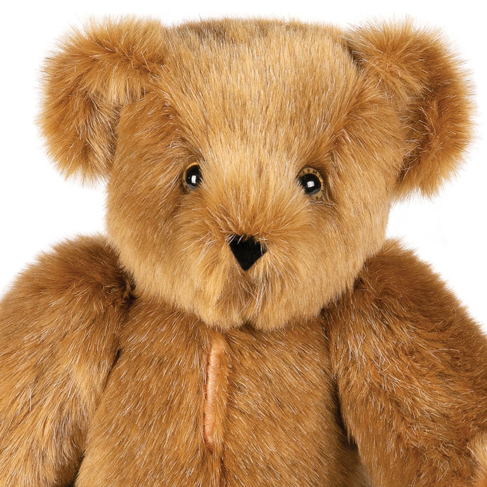 Brown plush teddy bear with black eyes and triangular nose, 15-inch soft fur.