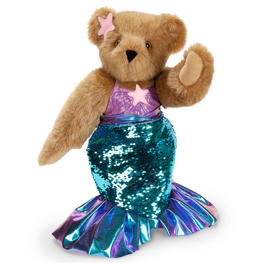 Honey-colored mermaid bear with purple star top and teal sequined tail fin.